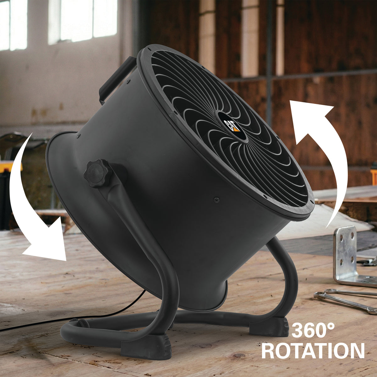 A large black industrial fan with a curved stand, shown in a workshop setting with white arrows indicating 360-degree rotation. The CAT logo is visible on the front grille.